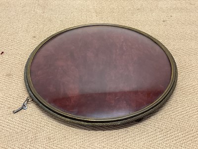 Lot 79 - A 19th century circular wall mounted velvet...
