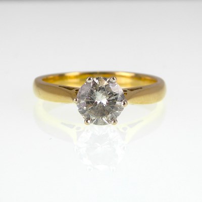 Lot 959 - An 18ct yellow gold diamond solitaire ring,...