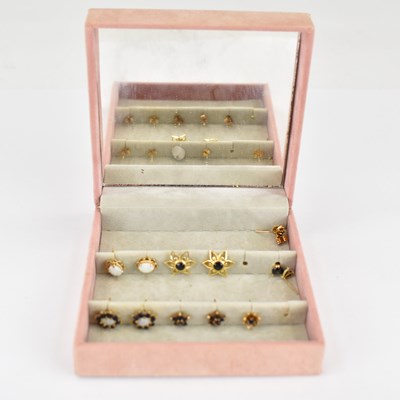Lot 1016 - Six pairs of 9ct gold stud earrings to include...