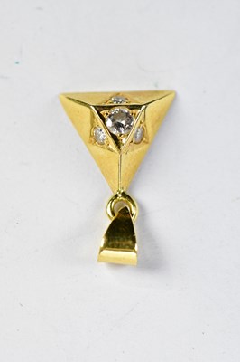 Lot 391 - An 18ct yellow gold triangular shaped pendant...