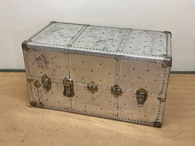 Lot 625 - Aluminium travelling trunk with rivet...