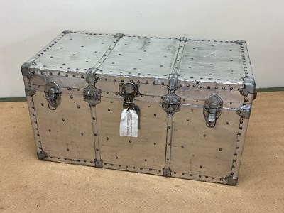 Lot 626 - Aluminium travelling trunk with rivet...