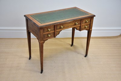 Lot 1053 - An Edwardian inlaid mahogany writing table...