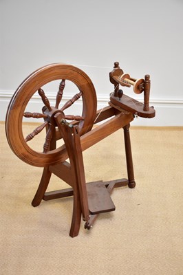 Lot 1200 - A modern hardwood spinning wheel.