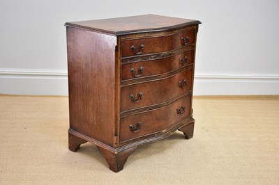 Lot 1132 - A reproduction mahogany serpentine fronted...