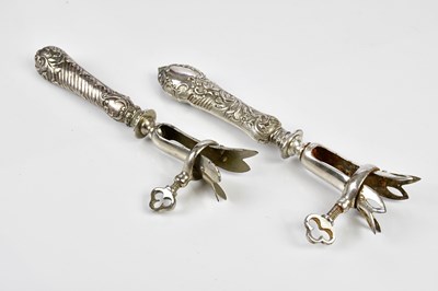 Lot 2017 - Two French white metal lamb bone holders, with...