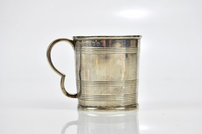 Lot 2079 - A George II silver christening mug, London...