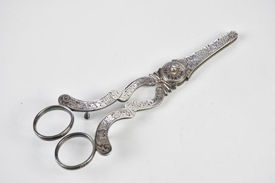 Lot 2148 - A pair of Dutch white metal grape scissors,...