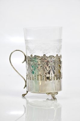 Lot 2170 - A George V hallmarked silver cup holder and...