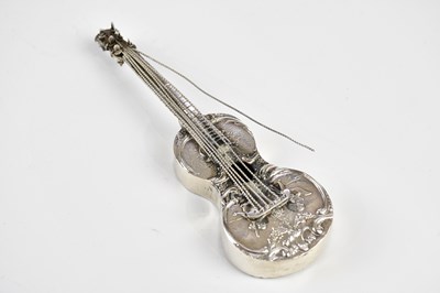 Lot 2149 - A Continental novelty white metal model of a...