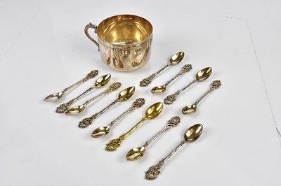 Lot 2032 - A set of twelve Continental plated tea spoons,...