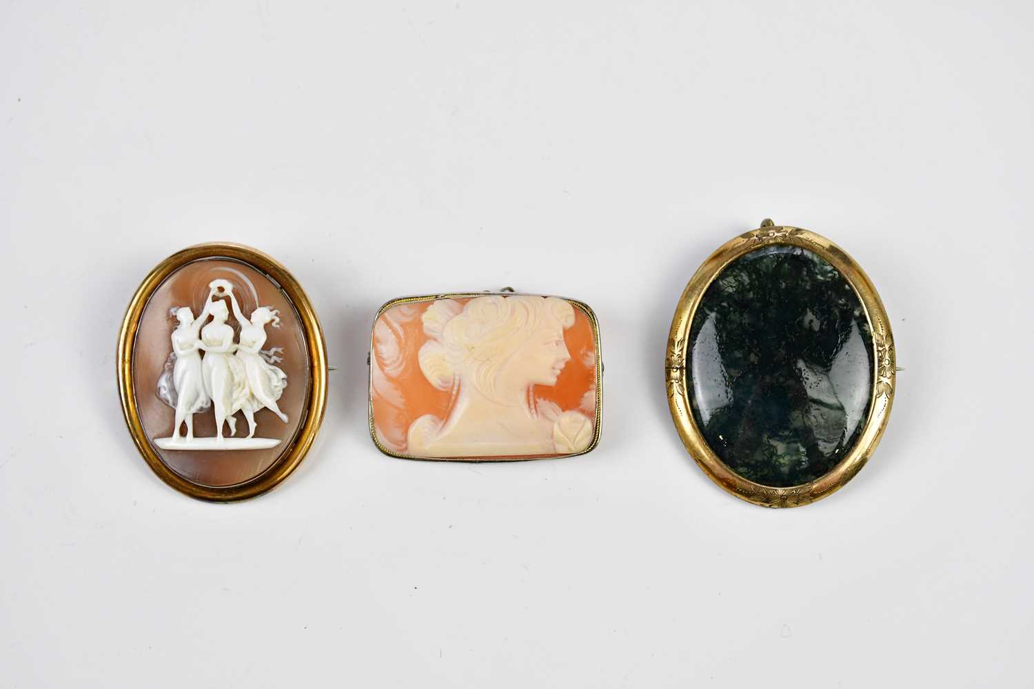 Lot 451 - A Victorian gilt metal cameo brooch, decorated...