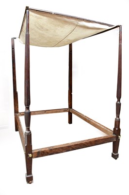 Lot 1011 - A mahogany and oak four poster bed, with...