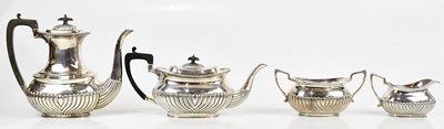 Lot 2043 - A silver plated four piece tea service with...