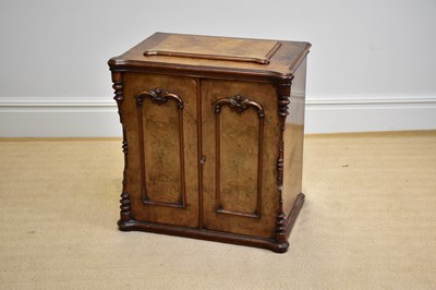 Lot 1052 - A 19th century walnut sewing machine cabinet,...