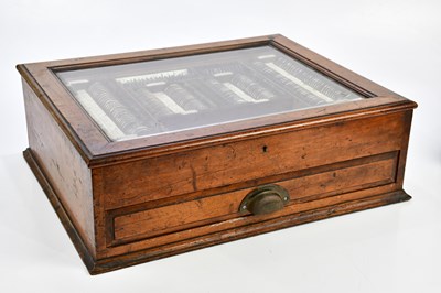 Lot 1255 - A Victorian boxed set of optician's lenses,...