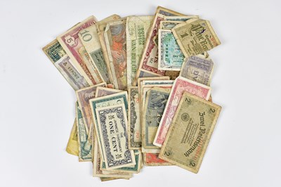 Lot 2597 - A large collection of world banknotes,...