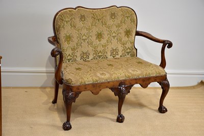 Lot 1000 - A GEORGE III style walnut settee, early 20th...