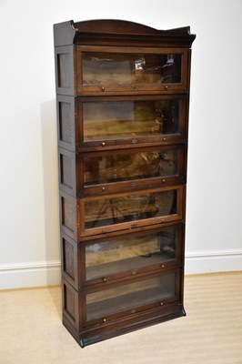 Lot 1002 - THE LEBUS BOOKCASE; an oak six division...