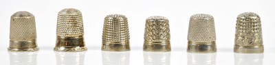 Lot 2193 - Three hallmarked silver thimbles, combined...