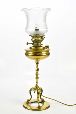 Lot 1562 - An early 20th century brass oil lamp with...