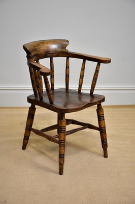 Lot 1189 - An early 20th century elm seated smoker's bow...