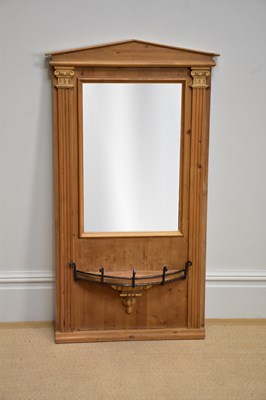 Lot 1194 - A modern pine wall mirror of architectural...