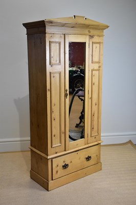 Lot 1190 - An old pine wardrobe with moulded cornice and...
