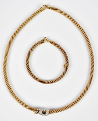 Lot 314 - WELLENDORF RETAILED BY BOODLES; an 18ct satin...