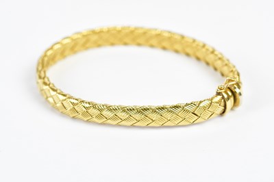 Lot 274 - An 18ct yellow gold textured bracelet, length...