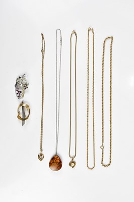 Lot 360 - Four 9ct yellow gold/yellow metal chains, two...