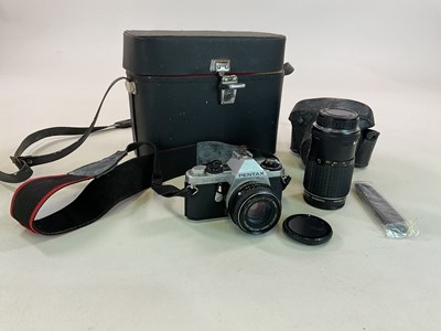 Lot 430 - A Pentax ME, with an Ashai lens, in carry case