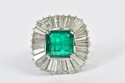 Lot 61 - A white metal emerald and diamond ballerina...