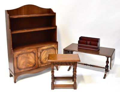Lot 22 - A reproduction mahogany bookcase over two-door...