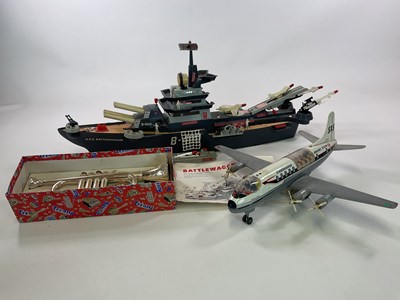 Lot 381 - A battery operated tin and plastic...