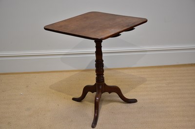 Lot 1192 - An early 19th century oak tilt-top occasional...