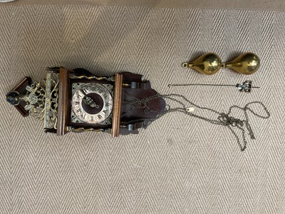 Lot 1523 - A Dutch brass and walnut wall clock, with...