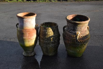 Lot 1227 - Three terracotta garden vases, tallest 77cm (3)