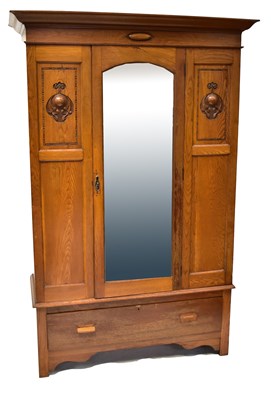 Lot 54 - A late 19th/early 20th century oak three-piece...