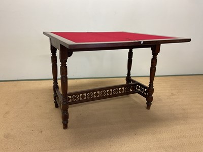 Lot 700 - A 19th century mahogany folding card table on...