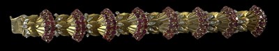 Lot 1422 - An 18ct yellow gold Art Deco style ruby and...