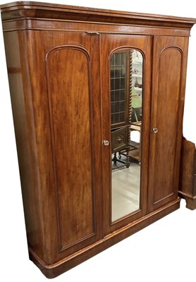 Lot 43 - A Victorian mahogany three door wardrobe with...