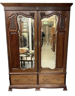 Lot 71 - An early 20th century mahogany wardrobe, with...
