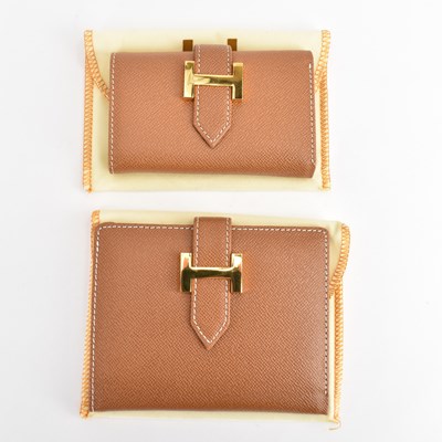 Lot 405 - HERMÈS, PARIS; two boxed brown leather...