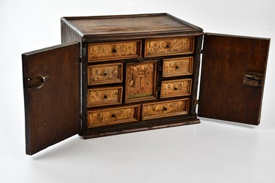 Lot 1249 - A 19th century oak and marquetry table cabinet,...