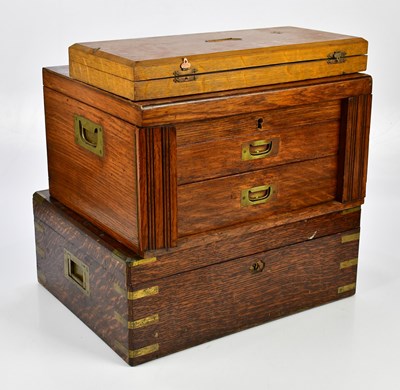 Lot 2012 - Two oak cased canteens with an assortment of...