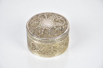 Lot 2192 - An Eastern white metal circular trinket box...