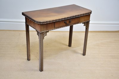 Lot 1074 - A carved mahogany Chippendale style tea table,...