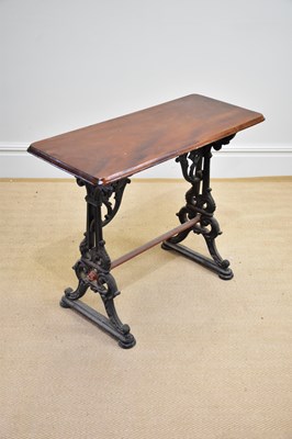 Lot 1080 - A mahogany rectangular table, with cast iron...