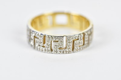 Lot 1193 - A 14ct yellow gold Greek key decorated ring,...